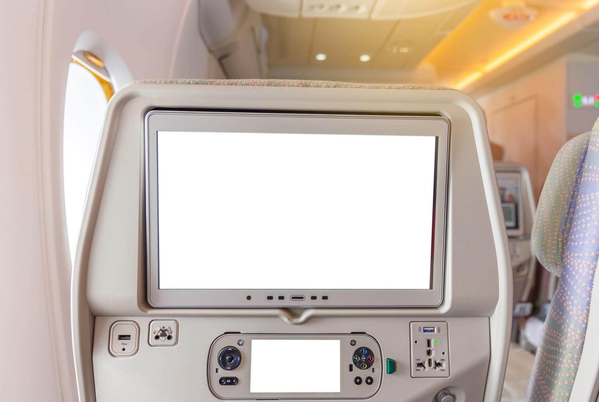 Multifunktionaler Sitz mit Anschlüssen und Screen | Emirates Business Class

